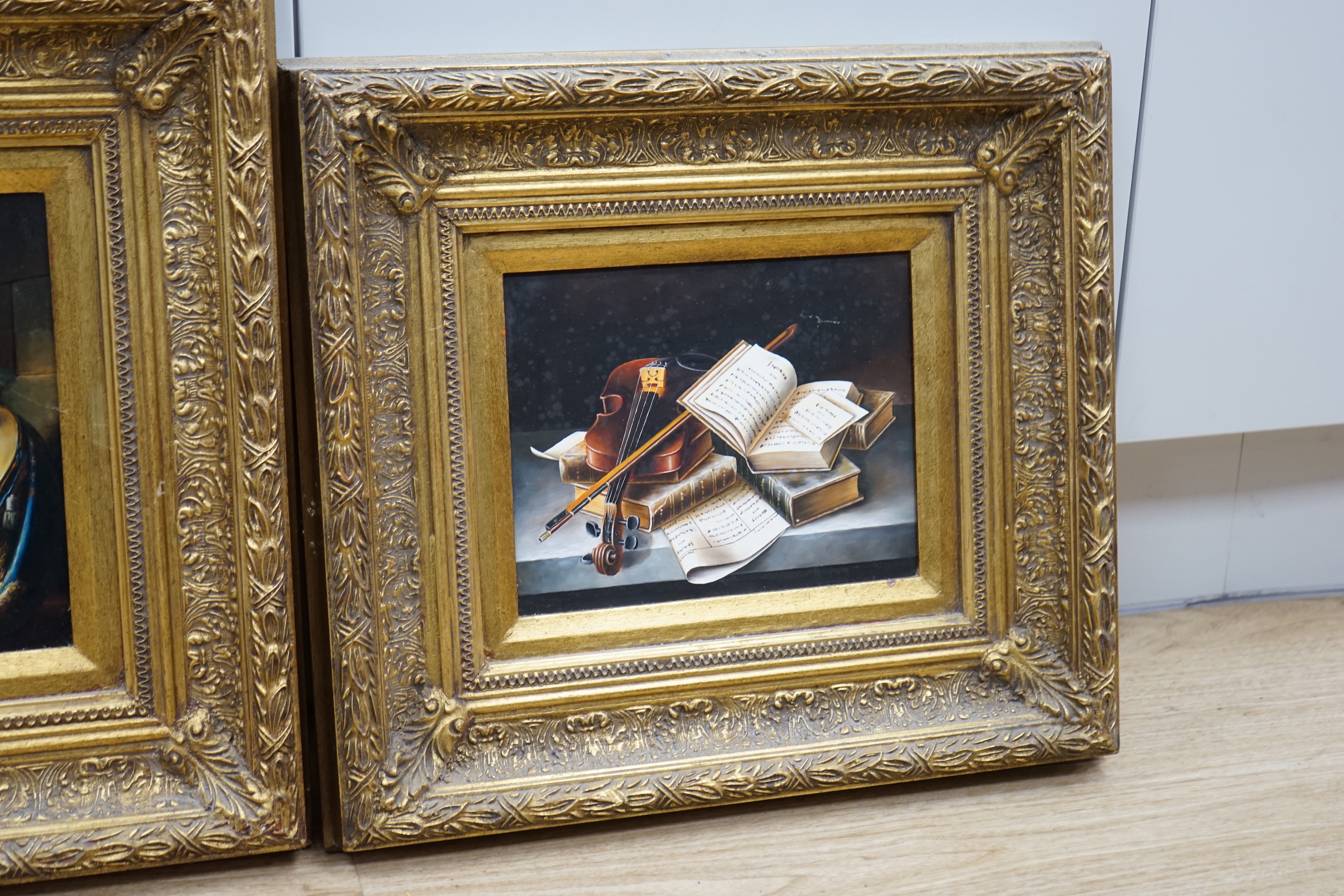 A Herin, set of three contemporary oils on board, Still lifes of musical instruments and sheet music, two signed, each 19 x 24cm, ornate gilt framed